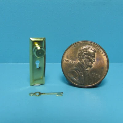 Dollhouse Miniature Gold Metal Door Knob with Key Plate and Key CLA05528 - Image 1 of 2