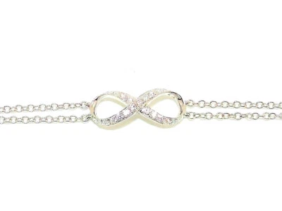 9CT HALLMARKED WHITE GOLD 0.15CT G/H SI NATURAL DIAMOND INFINITY BRACELET 7" - Image 1 of 4