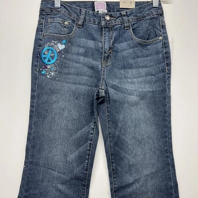 Pantalones de mezclilla Canyon River Blues para niñas azul medio enjuague acampanados cintura ajustable 14 signo de paz Foto 1 de 4