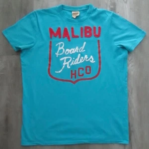 T-SHIRT VINTAGE HOLLISTER MALIBU BOARD RIDERS BLU STAMPA SERIGRAFICA DA UOMO TAGLIA XL - Foto 1 di 2