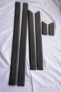 Juego de molduras laterales de puerta negras para Mazda 626 87-92 paneles de goma exteriores OEM - Imagen 1 de 4