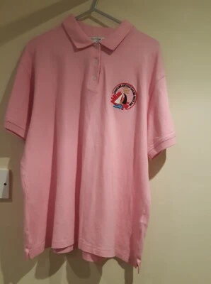 Unworn ladies pink polo shirt. Vintage team sailing memorabilia  Antigua 2008. - Image 1 of 4