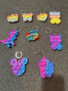5 Kinder Zappel Spielzeug. Push Bubble Grübchen Tierfiguren. (5er Set!) - Bild 1 von 18