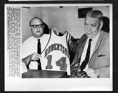 1965 Press Photo, Royal's President Tom Grace & Gen. Mgr. Holds up Big Os Jersey - Image 1 of 3