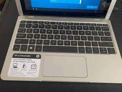 Portátil HP, pantalla táctil, plateado, 10,1 pulgadas Foto 1 de 4