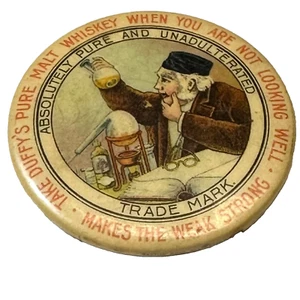 Espejo de bolsillo de celuloide de 1,75" DUFFY'S PURE MALT WHISKEY Makes The Weak Strong - Imagen 1 de 3