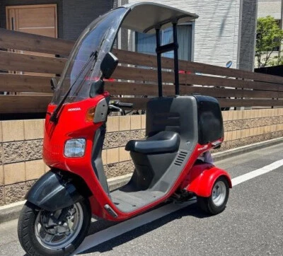 PALANCA DE BLOQUEO DE ESTACIONAMIENTO HONDA GIROSCOPIO TOLDO CUATRO TIEMPOS TA03 47113-GAG-J51 Foto 1 de 4