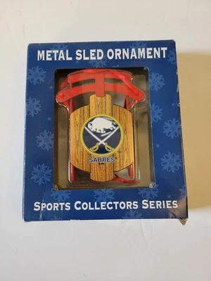 Buffalo Sabres METAL SLED CHRISTMAS ORNAMENT WITH ICONIC TEAM LOGO ON SEAT - Image 1 of 3