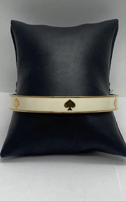 Brazalete Brazalete Kate Spade Metal Tono Dorado Crema Firma 26.8g Foto 1 de 4