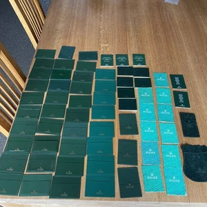 Rolex Konvolut Ledermäppchen , Garantie Beschreibungen und mehr - Bild 1 von 16