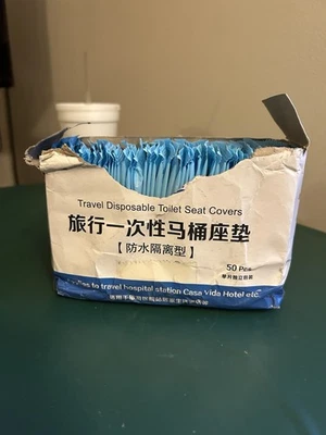 Caja de 50 fundas de asiento de inodoro desechables de viaje envueltas individualmente Foto 1 de 4