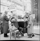 Flower vendor in the city of Vienna Switzerland 1946 Old Historic Photo