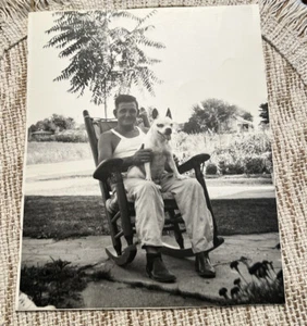 Photo 8x10 Man Holding Dog In Rocking Chair Outside Sunshine Trees 8x10 - Picture 1 of 9