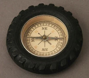 VINTAGE COMPASS NAVIGATOR INSET IN RUBBER CAR TIRE VINTAGE NOVALITY - Picture 1 of 2