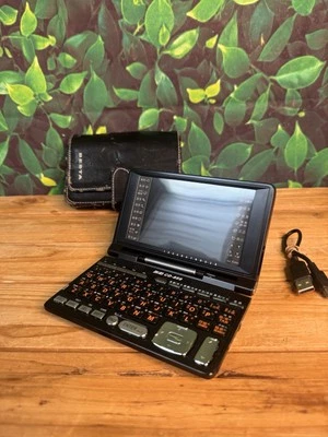 Diccionario de computadora recargable negro Inventec Besta Mini Invincible CD-859 Foto 1 de 4