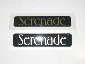 PAAR NEUE ORIGINAL FORD ESCORT SERENADE SCHWARZ & GOLD ABZEICHEN SP5156 - Bild 1 von 3