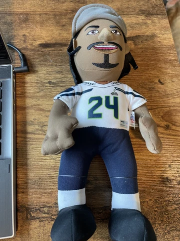 Marshawn Lynch   Bleacher Creature    Plush Figurine (Seattle Seahawks) Cover