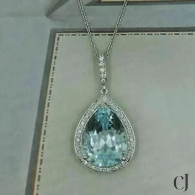 Colgante de boda con halo de moissanita corte pera azul de 3 quilates de oro blanco sólido de 14 quilates para ella Foto 1 de 4