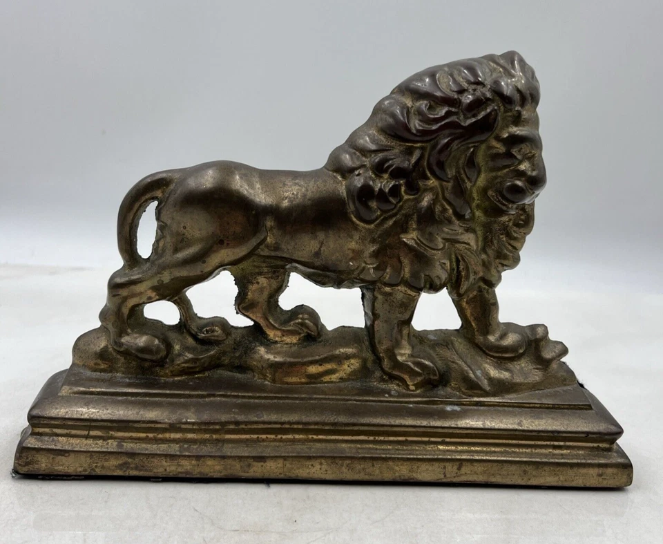 Tope de puerta vintage de latón fundido de metal león siglo XX Foto 1 de 4