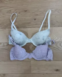 2 Stck. 34A Warner's lila Spitze Calvin Klein elfenbeinblau geformte gefütterte BHs gebraucht, in einwandfreiem Zustand - Bild 1 von 7