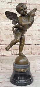Sculpted Home Decor: Signed Bronze Figurine of Boy and Dolphin Artwork - Picture 1 of 10