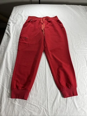 Calça esfoliante Figs Technical Collection feminina fios para fios vermelha M/P - Imagem 1 de 4