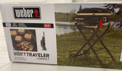 Parrilla portátil compacta Weber 11000 BTU Traveler 32" de ancho modelo #1500460 negra Foto 1 de 4