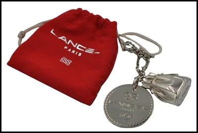 RARE PORTE-CLÉS VINTAGE SIGNÉ LANCEL PARIS ELSA FORME SAC ARGENT - Photo 1/4