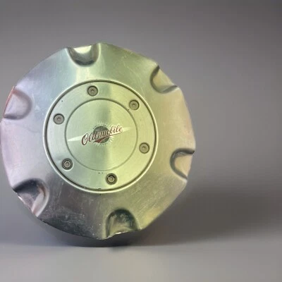 Oldsmobile Bravada Final 500 2004 tapa central de rueda de aluminio 9593401 de colección rara Foto 1 de 4