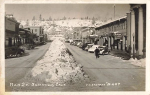 Susanville CA Main St. Snow Chains Barber Pole Cars Café c1940 RPPC Postcard 763 - Picture 1 of 3