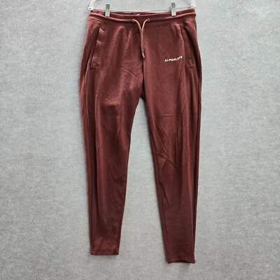 Pantalones deportivos Alphalete para hombre Medianos Marrón Jogger Logo Aprende Sueña Ser más Foto 1 de 4