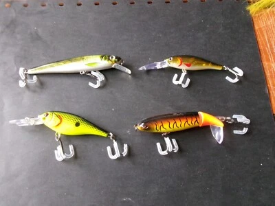 4 leurres de pêche a la truite neufs. avec bruiteur. - Photo 1/4