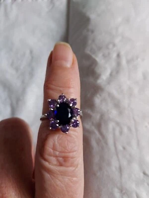Oval Blue Sapphire Halo Ring Surrounded by Purple Amethyst in Size 7 - Image 1 of 4