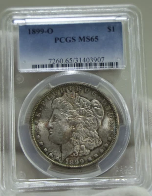 1899 O US Morgan Silver Dollar $1 PCGS MS65 Nice Toning - Image 1 of 2