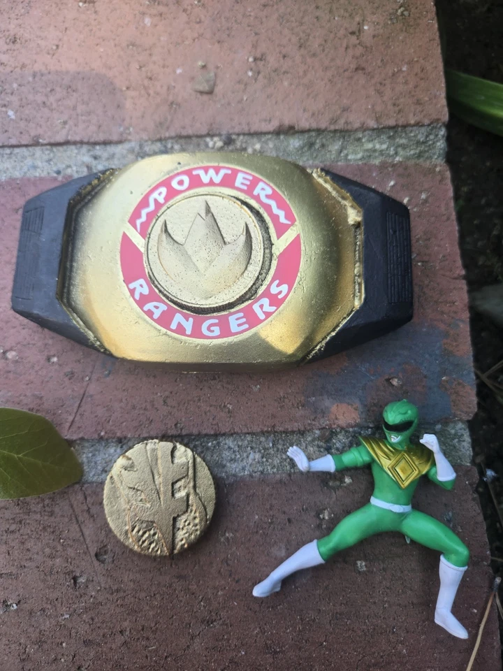 Hebilla de acrobacias Power Rangers con monedas Ranger verdes y blancas Foto 1 de 1