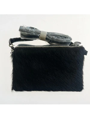 Bolso sin asas/bross Montana West de cuero de vaca con pelo - negro Foto 1 de 4