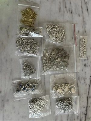 Lot of Star Of David, Hamsa, And Other Small Ready To Wear Jewelry 11 Bags - Image 1 of 4