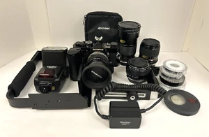 Olympus OM-2n SLR OM nera con obiettivi vivitar assortiti e accessori - Foto 1 di 24