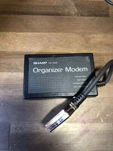 Modem organisateur Sharp CE-350X - Photo 1 sur 4