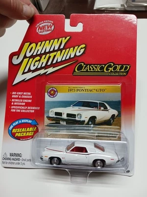 Pontiac GTO 1973 1/64 Johnny Lightning clásico dorado blanco diecast coche de juguete B16 Foto 1 de 4