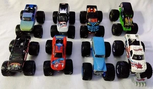 LOT OF 8 Monster Jam Trucks 1:64 Reptoid Spider-Man Madusa Predator Digger +3 - Picture 1 of 24