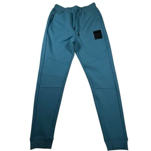 MANTEL MARKE UNISEX türkis JOGGINGHOSE KLEIN VERSTECKT IN SCHLICHTER SICHT - Bild 1 von 7