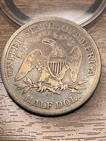 1876 CC 50c Seated Liberty Half Dollar Nice VF Obv ScratchCarson City Blue Tone Cover