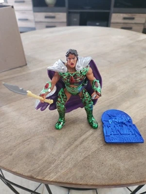 Figura de acción Trendmasters 1995 Tarzán Epic Adventures (Tarzán Dino blindado) Foto 1 de 4