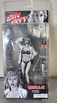 Figuras Frank Millers Sin City SHELLIE en blanco y negro - con cuchillo y botellas Foto 1 de 4