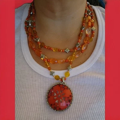 2007 Avon Pierced Spice Colored Pendant Necklace  Red Laser Cut - Image 1 of 4