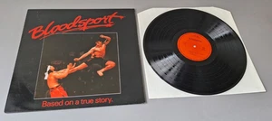 PAUL HERTZOG Soundtrack VAN DAMME original Vinyl LP BLOODSPORT (1990) - Imagen 1 de 2