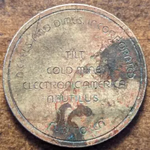 Token arcade de mina de oro inclinable incorporada de níqueles y monedas de diez centavos Carrollton, Texas TX - Imagen 1 de 4