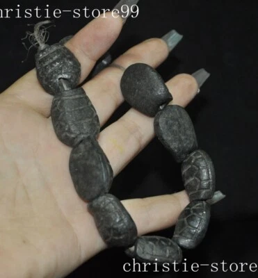 China Hongshan Cultura meteorito hierro tallado tortuga estatua pulsera cadena de mano Foto 1 de 4