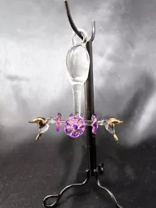 Mini statuina mangiatoia colibrì in vetro trasparente da appendere fiori viola uccellini oro - Foto 1 di 4